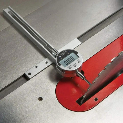 Digital Table Saw Gauge With ProGrade Hardened Aluminum Body, Anodized Black Finish, measuring near saw blade on table saw