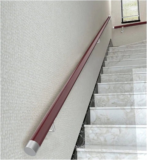 Heavy Duty 20 Foot Red PVC Railing Spindle With Non Slip Surface And Wall Mount Brackets Weatherproof Deck Balusters For Exterior Stairs And Patios mounted on a wall beside stairs.