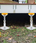 Built Tough As Nails 2 Pack Adjustable Support Jacks With Anti Slip Shock Absorbing Pads positioned under a platform for stability.