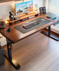 Brown Adjustable Standing Desk With Three Memory Buttons And Anti Collision Safety Tech For Home Office Setup features a sleek design and accessories.