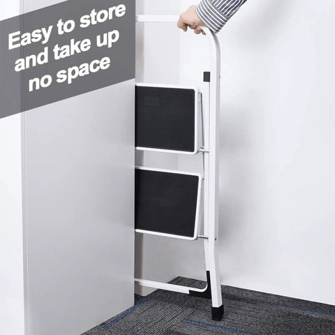 Heavy Duty Steel 2 Step Stool Ladder With Grab Handle Portable Folding Step Ladder compactly stored against wall