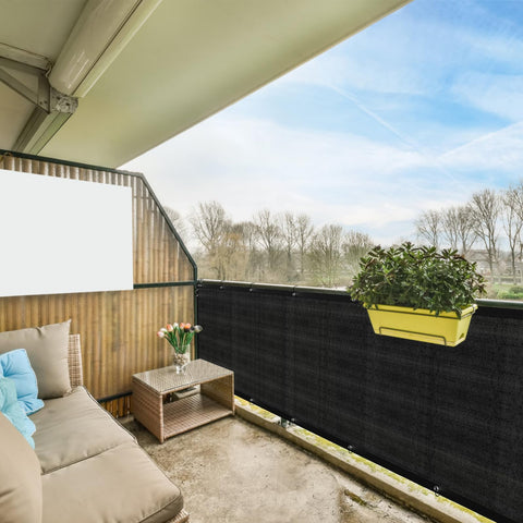 Privacy Fence Screen 3 Feet By 50 Feet Heavy Duty HDPE Mesh Shade Cover for balcony with plants and furniture