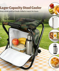 Foldable Camping Chair Backpack With Built In Cooler Insulated Picnic Bag open outdoors with contents like fruits and flask