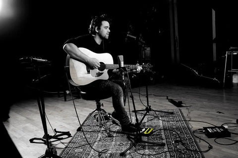 Musician playing guitar with Compact Digital Percussion Pad With 22 Onboard Sounds, Kick Drum Included, SPD-1K Yellow on floor