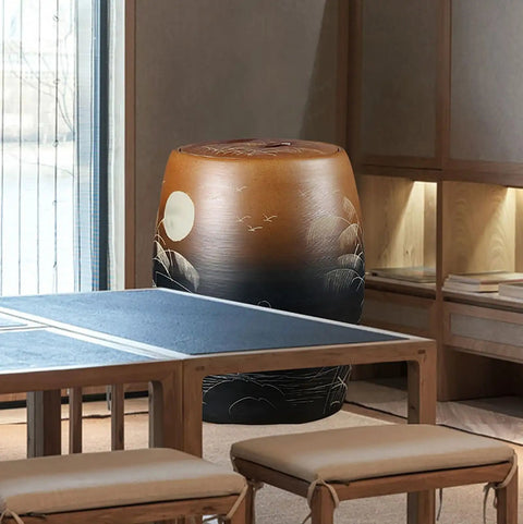 Top Shelf Ceramic Rice Jar With Lid For Kitchen Pantry Organization And Dry Food Storage in a modern kitchen setting near a table.