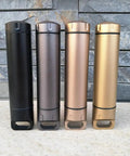Assorted colors of Portable Survival Waterproof Pill Container for Outdoor EDC Gear, CNC machined aluminum bottles on stone background.
