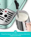 Compact Stainless Steel Espresso Machine With Powerful Steam Wand For Killer Lattes And Smooth Shots At Home featuring milk frothing pitcher.