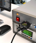 DeStatix A9 FTDI USB to RS232 Adapter With 9 Status LEDs connected to industrial equipment showing active indicators