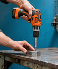 Person using a power drill with a 5 Piece Damaged Screw Extractor Set For Stripped Screws Easy Removal And Quick Fixes Ideal Gift For Men Dad Boyfriend Husband DIY Home Improvement Tool Kit on a metal block.