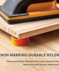 Four Piece Bench Dogs For 3/4 Inch Holes With EVA Insert securing wood on a portable workbench for precise cuts.