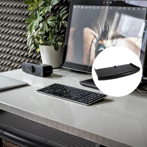 Built Tough Ergonomic Keyboard Tray Under Desk Slide Out Platform With Adjustable Tilt Angle Black Pp on a white desk with keyboard.