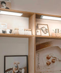 54 LED Under Cabinet Light With Rechargeable Wireless Motion Sensor Glare Free Illumination for Pantry Closet on wooden shelves