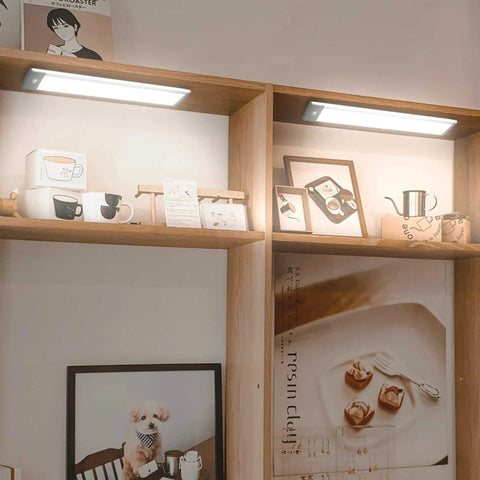 54 LED Under Cabinet Light With Rechargeable Wireless Motion Sensor Glare Free Illumination for Pantry Closet on wooden shelves