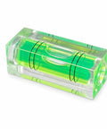 Bubble Level Vial, Spirit Level in green plastic with cylindrical vials and black line markings for accurate leveling.