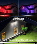 Outdoor LED Flood Light 80W 8000 Lumens Color Changing Smart Floodlight RGBW illuminating houses at night in red and blue hues