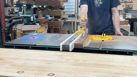 Adjustable Magnetic Featherboard For Table Saws And Router Tables Locks Stock Dead Tight Against Fence during woodworking.