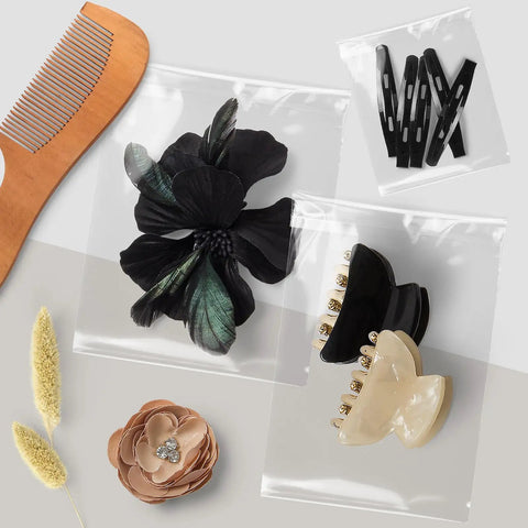 Crystal Clear 11x14 Self Sealing Sleeves Pack Of 100, 1.6 Mil Acid Free Resealable Bags with hair accessories inside