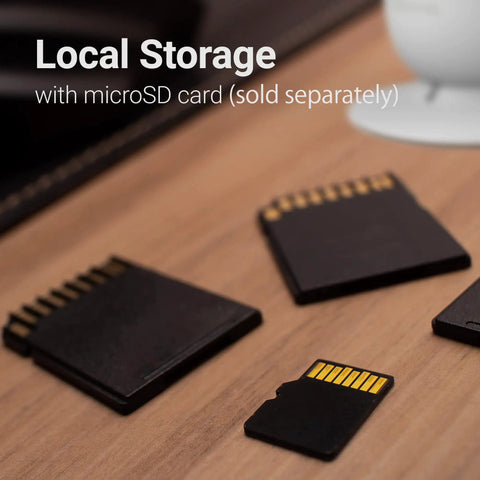 microSD cards on table highlighting local storage feature for CapsuleCam Pro Baby Monitor 4 Pack 1080p HD WiFi Indoor Security Cameras