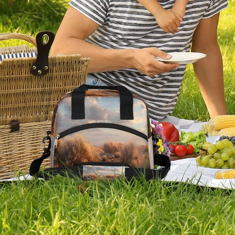 Desert Landscape Insulated Lunch Bag For Women And Men at picnic, leakproof thermal cooler tote next to basket and food.