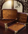 Slick Top Tier Jewelry Display Tray With Heavy Duty Wood Frame And Soft Fabric Lining No Sweat 24 Grid Stackable Organizer For Rings Earrings Necklaces Retail Ready Storage Case Black displayed on a table.