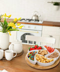 Ceramic Rotating Serving Tray With Six Removable Compartments Lazy Susan Style 11 Inch Divider Set with snacks on kitchen table