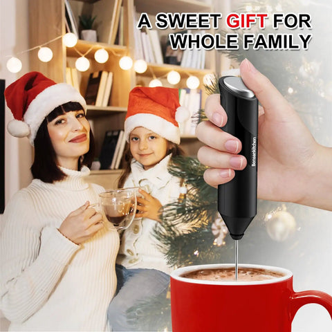 Hand holding a Powerful Milk Frother For Coffee And Lattes Fast Handheld Drink Mixer With Stainless Steel Whisk near a cup of coffee.