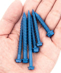 Heavy Duty Concrete Screws Set 175 Pieces Hex Head Masonry with Diamond Point, rust resistant, held in hand