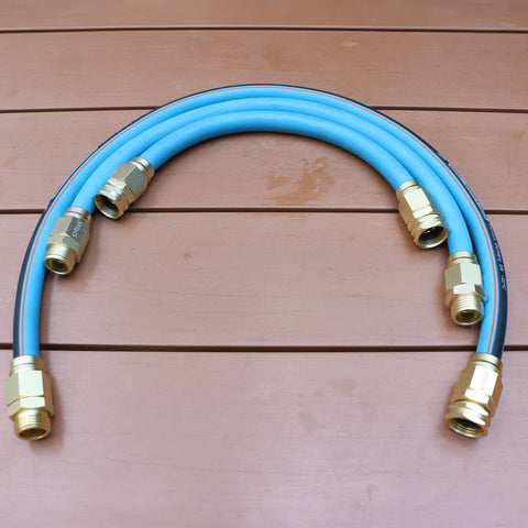 Five Eighths Inch Garden Hose Connector Repair Fittings Set with heavy duty aluminum ends shown on wooden surface
