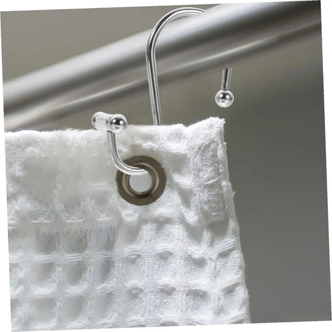 Close-up of silver curved ring from 12 Piece Rust Resistant Shower Curtain Hooks Curved Rings for Bathroom and Window Curtains