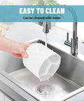 Cleaning the 360 Degree Rotating Pen Organizer with Diamond Like Design Five Compartment Desk Organizer under a kitchen faucet