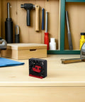Precision Adjustable Dowel Jig And Wood Rod Cutter For Crafting Perfect Tenons on a wooden workbench with tools.