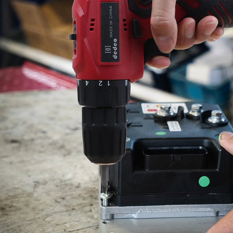 Cordless Hammer Drill Kit With 16.8V Power, 3/8 Inch Keyless Chuck being used on a metal surface