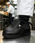 Heavy Duty Steel Toe Shoe Covers With Adjustable Strap Safety Overshoes For Work, black, durable fabric, kitchen setting.