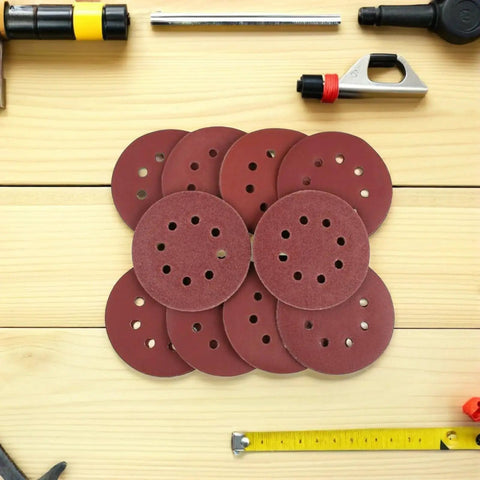 150 Pcs 8-Hole Sanding Discs With Loop Back For Smooth Grinding On Metal Plastic And Wood, Premium Dry Sandpaper Sheets stacked.