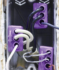 AlumiConn Wire Connectors 2500 Pack Purple Electrical Aluminum Copper Wiring Repair Kit connecting multiple wires inside an outlet.