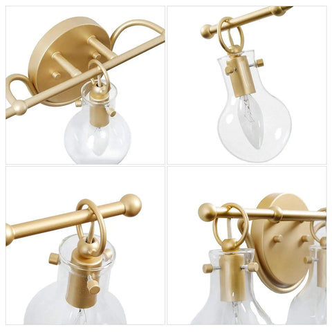 Details of Brushed Gold Vanity Light Fixture With Three Clear Glass Globes Over Mirror, Damp Rated Bathroom Bar