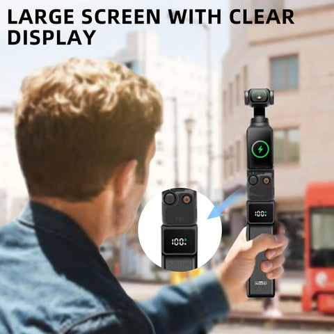 Person using High Capacity Battery Handle For Osmo Pocket 3 And 4 On The Go 5000mAh Power Grip with Mini Tripod in urban setting