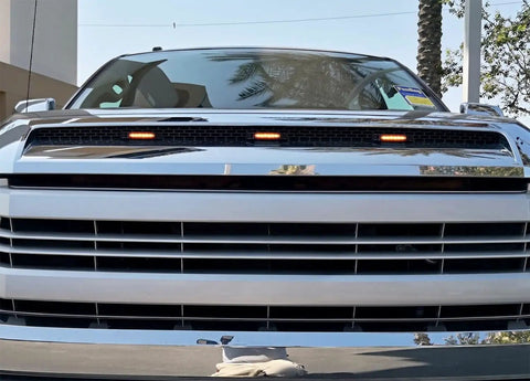 Front view of Toyota Tundra grille with installed Smoked Lens Amber LED Grille Lights Kit For 2014 To 2021 Toyota Tundra Center Set 3 Piece Marker Lamps With Wiring Harness And Hardware IP66 Weatherproof Housing And Heavy Duty Installation