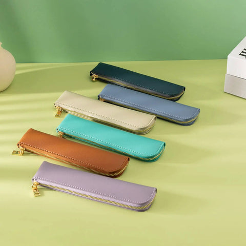 Collection of slim leather pencil cases with zippers in various colors including the Purple Leather Pencil Case For Adults Slim Soft Pen Bag With Zipper Minimalist Pencil Pouch Premium Leather Craft For Pros Ultra Lightweight Office And School Storage For Notes Drafts And Everyday Carry on display