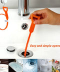 Person using 4 Pack 19.6 Inch Drain Snakes Hair Clog Remover Flexible Barbed Wand for unclogging sink drain.