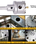 Pro Grade Carbide Tipped Hole Saw Kit 4-1/2 Inch Cutter with two titanium-plated pilot bits drilling various metals