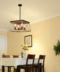 Farmhouse Pendant Light Fixture, 4 Light Geometric Rustic Chandelier For Kitchen Island And Dining Room hanging in dining space