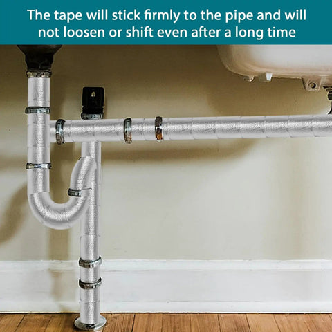 Peel And Stick Outdoor Foam Pipe Insulation Tape 2 Inch By 33 Feet Aluminum Finish installed on plumbing pipes under sink.