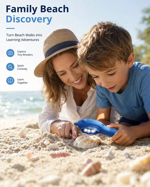 Go-To Pocket Sized Explorer 500X Handheld Digital Microscope For Kids With 2 Inch IPS Screen Portable STEM Toy For Travel Camping And School Projects Ages 5-12 Dark Blue shown at beach with child and adult