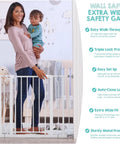 Woman holding child standing beside Extra Wide Baby Safety Gate For Openings From 29 To 41.5 Inches, 30 Inches Tall, Includes Two 4 Inch Extensions