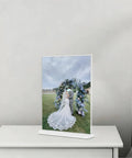 Clear Acrylic Sign Holder 4x6 Inches Three Pack T Shape Desktop Display Stand Double Sided Vertical Table Sign Holder For Restaurants Office Shop Wedding showcasing a wedding photo on a bedside table.