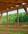 Built Like A Tank Heavy Duty I Shape Post To Beam Connectors Four Pack 10 By 3 Inch Mending Plates attached to a wooden frame.