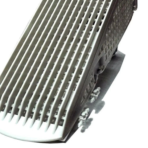 Close-up of 4 Pack Wedge Downspout Gutter Guard For 2 By 3 Standard Downspouts showing slotted design for debris removal