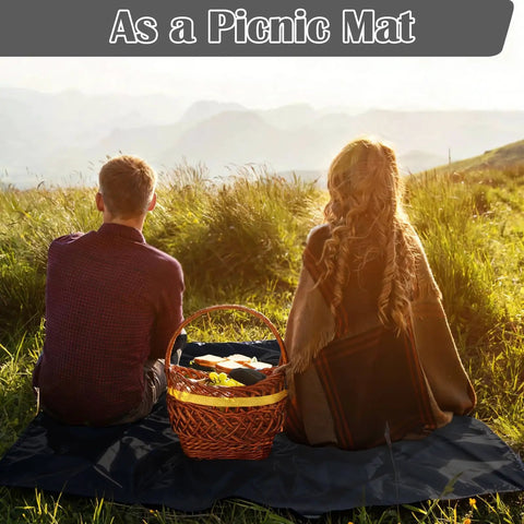 Two people sitting on Waterproof Tent Footprint Ground Cloth Tarp 87 By 59 Inches Ultralight Floor Mat with picnic basket