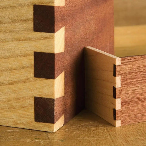 Slick Miniature Dovetail Template And Bit Kit showing clean quarter inch finger joints between hardwood box corners.